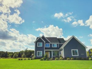 Modern house with blue sky background.